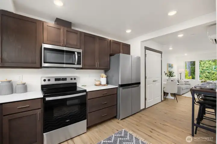 Seamless flow from living to kitchen makes entertaining effortless.