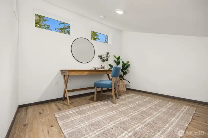 Bright loft space—ideal for reading, hobbies, or an inspiring work nook.