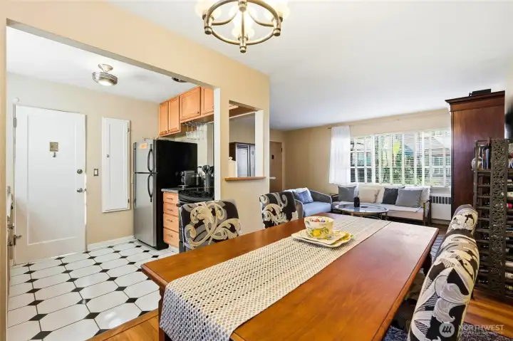 Hardwood floors, abundant natural light, and an open-concept layout create a bright & inviting space with excellent flow