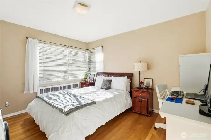 Spacious bedroom has work from home space