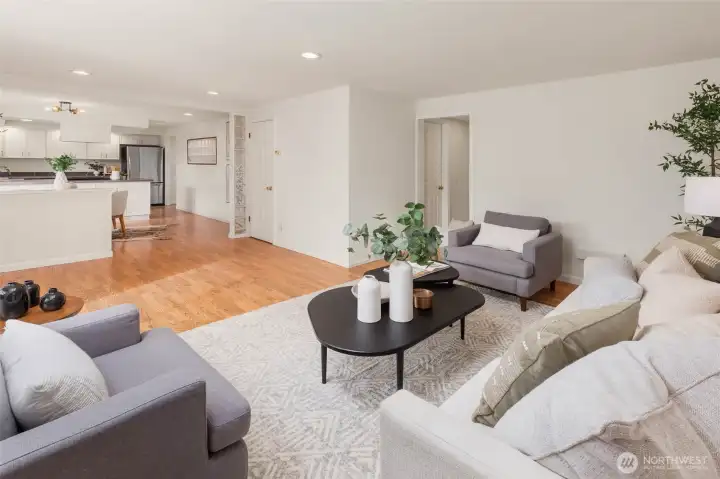 Off the hallway in this living space is access to the 2-car garage, a 3/4 bath and an extra space/mudroom.