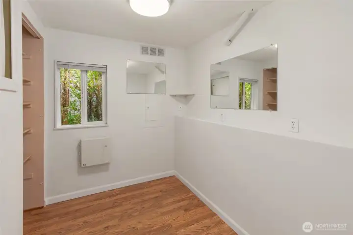 This small, versatile room makes for a great mudroom or just a space for extra storage or hobbies.