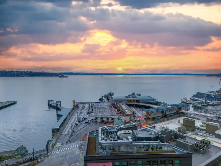 This sophisticated 1-bedroom, 1-bath residence offers sweeping views of the Olympic Mountains, Puget Sound, and the ever-changing Seattle skyline, creating a stunning backdrop for everyday living. Expansive windows flood the home with natural light, while the open layout is ideal for both entertaining and quiet evenings above the city.