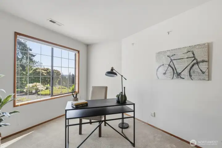 Downstairs bedroom staged as an office.
