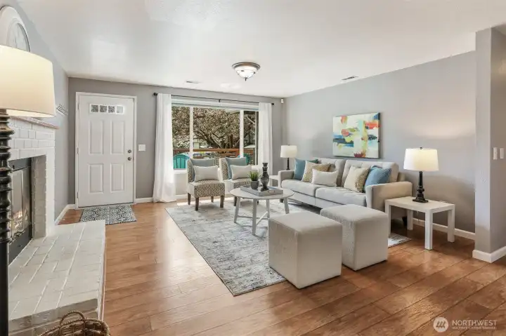 Nice formal living room that flows seamlessly into the dining area and kitchen.