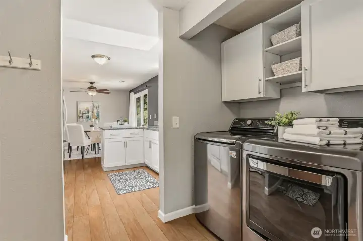 The laundry space is right off of the kitchen.