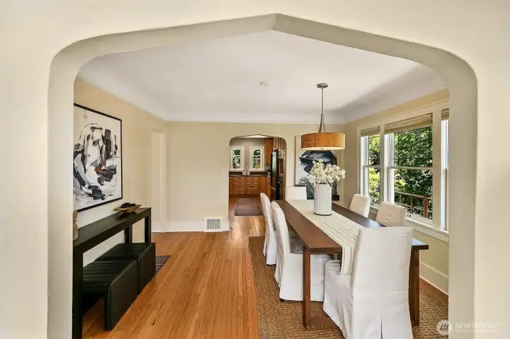 Archway leads to the formal dining room and then kitchen. Archway leads to the formal dining room and then kitchen.