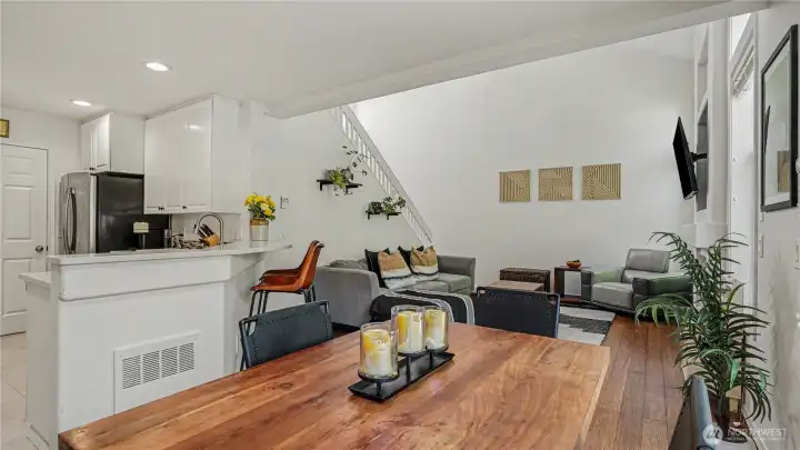 Spacious dining area just off the kitchen, eat up bar area for more casual dining