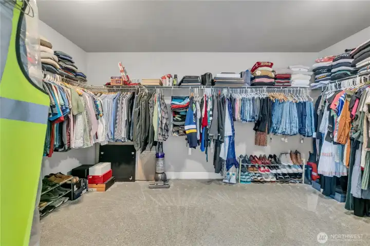 Spacious primary suite walk-in closet