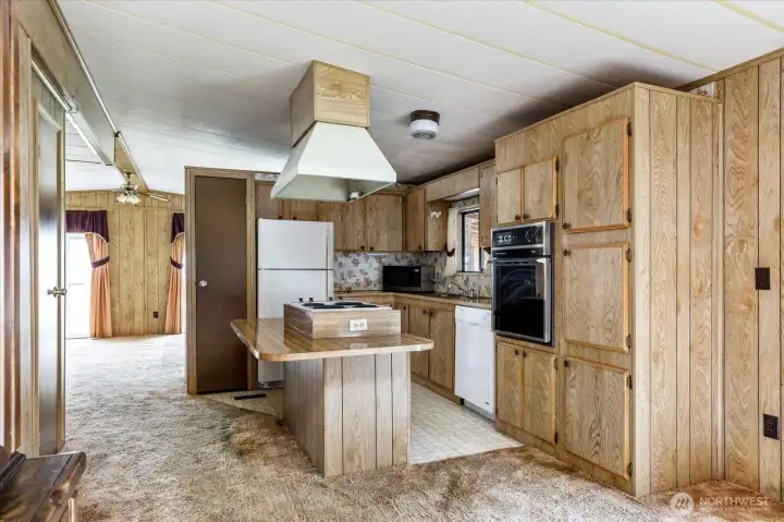 Kitchen offering plenty of cabinet and storage space.