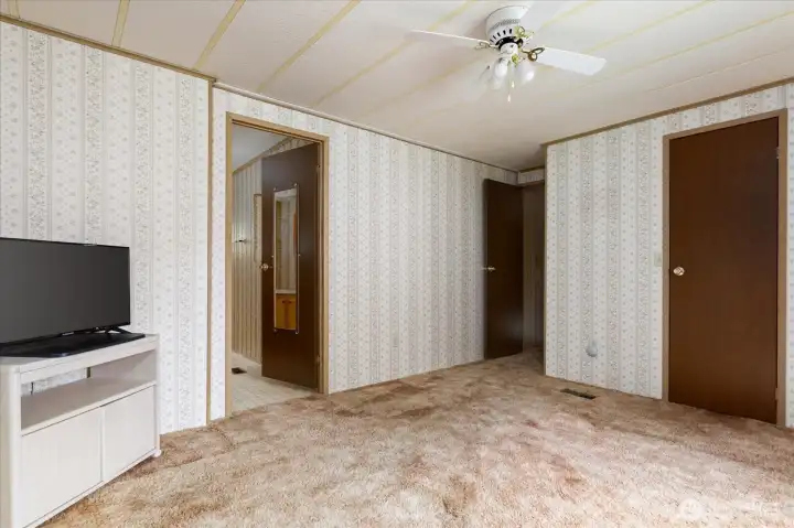 Primary bedroom with walk in closet and en suite bath.