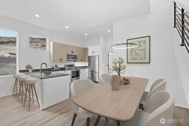Main-level photos have been virtually staged to highlight the home's full potential.