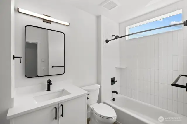 Bathroom filled with natural lighting for a bright, refreshing feel.