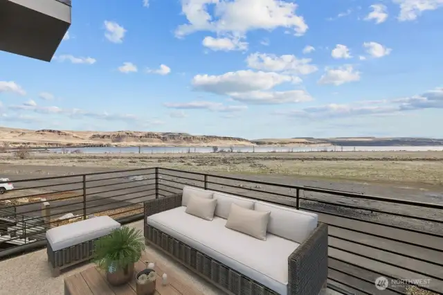 Breathtaking views from the outdoor deck. Photo has been virtually staged.