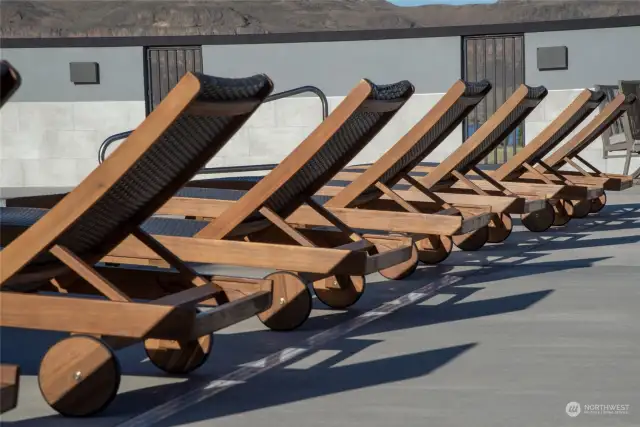 Poolside chairs perfect for relaxing and lounging in style.