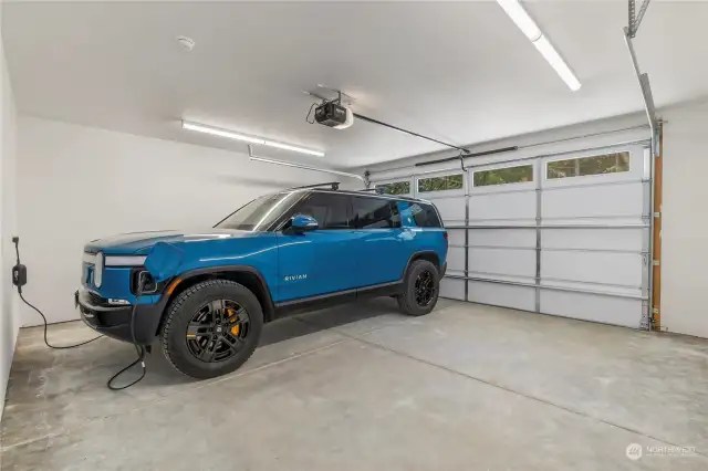 "Right Sized" 22' wide 2-Car Garage features a 240v Level-2 EV charging outlet.