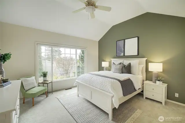 The primary bedroom suite is conveniently located on the main floor.  It boasts a luxurious 5-piece bath and an expansive walk-in closet.