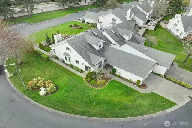 The surrounding lawn and landscape is maintained by the HOA...and wraps around your home.