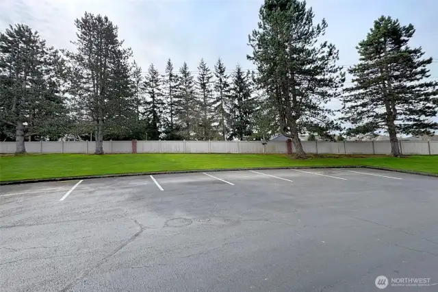 There are 2 large guest parking areas near this home.