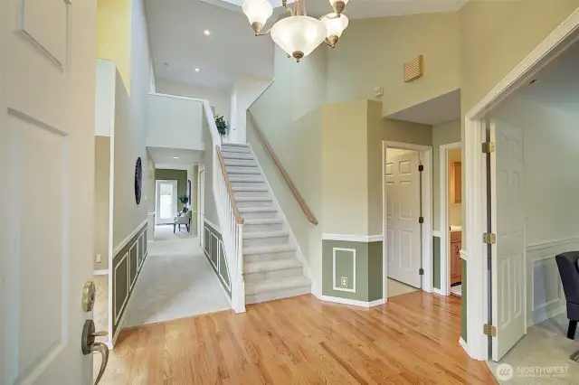 Just inside the front door you will be impressed by the vaulted ceilings and beautiful hardwood floors.