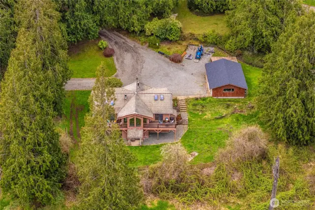 3,040 Sq foot daylight rambler plus 900 sq ft detached shop/garage w/ additional carport.