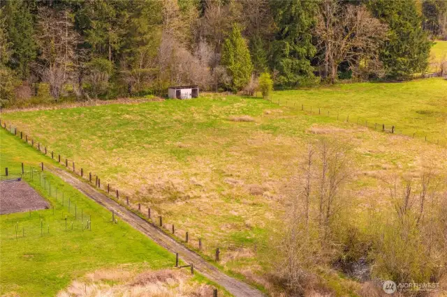 2 acre fully fenced pasture at lowest end of property. Both existing pastures run adjacent to the creek and have been used for livestock before.