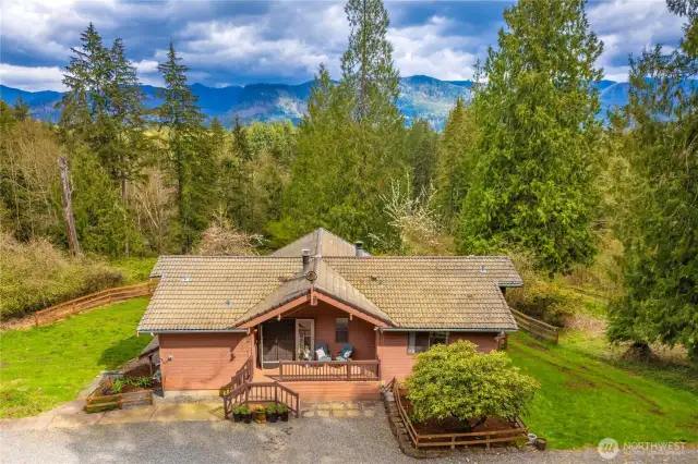Beautiful views from the home and the two decks that overlook trees and the mountains.