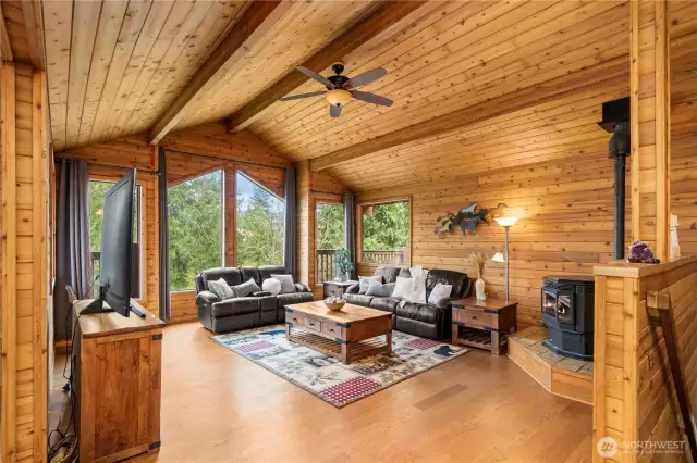 Warm, inviting cedar paneling throughout the upper level creates the ultimate wow factor in this unique, custom built  PNW Contemporary home!