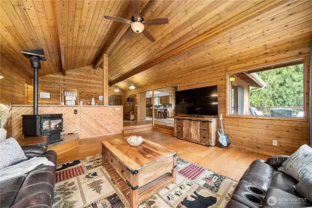 Vaulted ceilings in the living room and HUGE windows that overlook the view and the two decks.