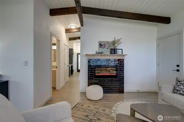 Luxury vinyl flooring flows throughout the home, offering both durability and style.