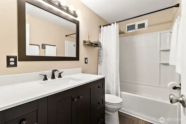 Tastefully updated bathroom with fresh finishes.