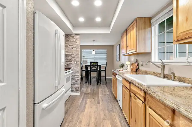 This galley kitchen offers effecient workflow, ample counter and cabinet space and is easy to keep clean and organized.