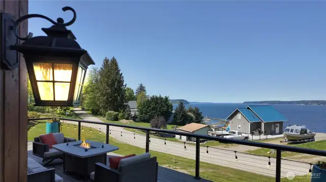 View from the 720 sq ft new deck with the 'Raincapture System' underneath. This system captures all the rain run off & can be used for irrigation, pressure washing, car washing etc. This also keeps the lower level dry which allows for all season use.
