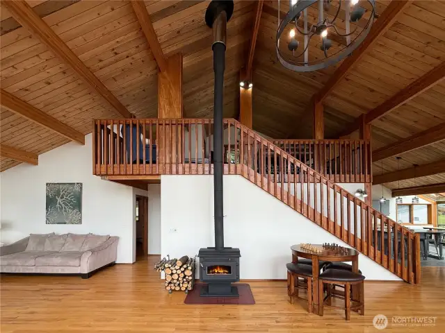 Soaring ceilings with gorgeous exposed beams & real hardwood floors, interior is freshly painted.