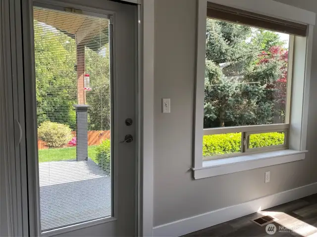 Exterior doors with in-glass blinds and retractable screens