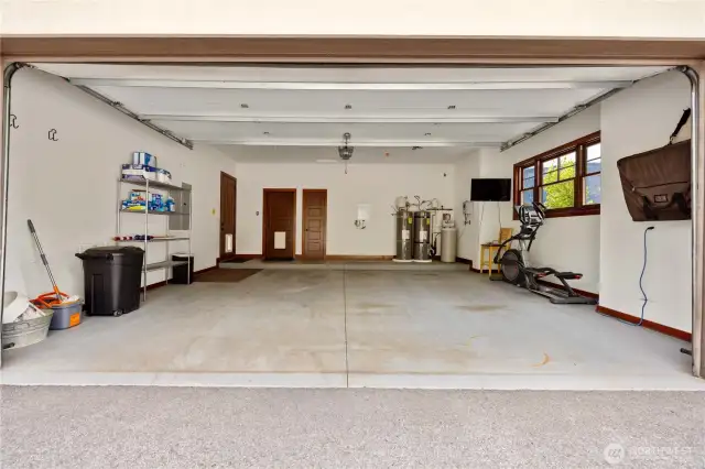 • Garage & Utility Ready  o Two-car attached garage with 220V outlet (EV-ready)  o Two hot water heaters  o Home electric system compatible with gas generator