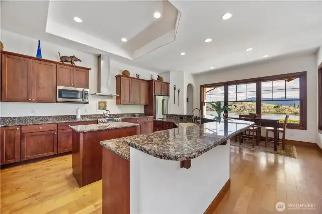 Country home with vineyard and fruit trees    Estate with buildable second lot and water rights    Property with shop, garage, and fenced dog area    Home with dual-fuel kitchen appliances and media room    Washington vineyard and equestrian property for sale