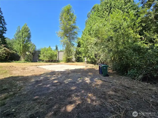 Mobile home has been removed, and the pad remains.