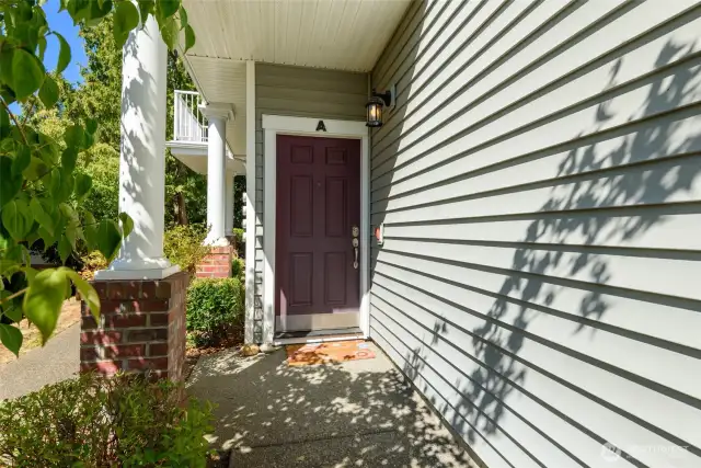 Private entry with covered access.