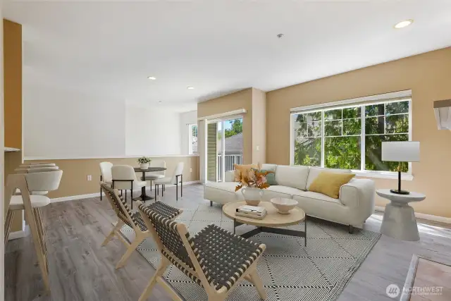 Virtually staged. Seamless flow from living to dining area.