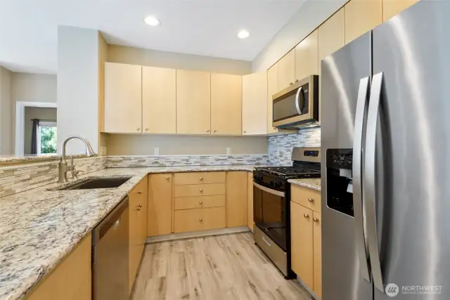 Fully remodeled kitchen with modern finishes.