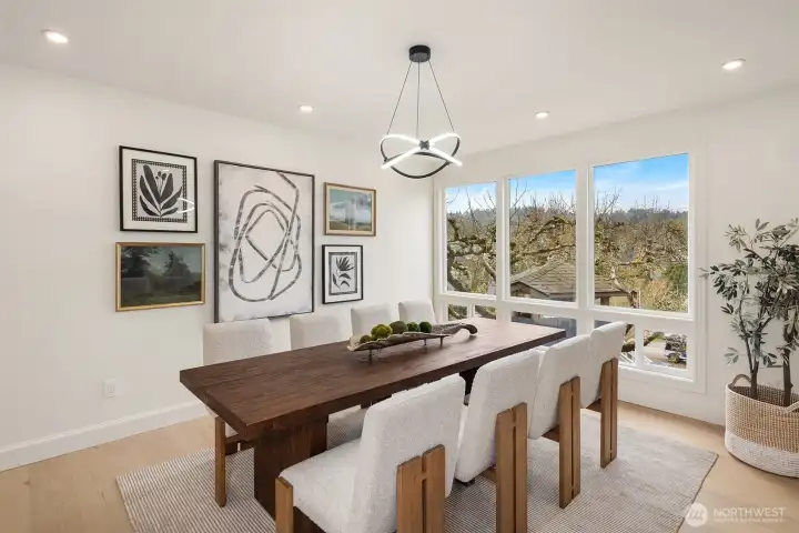 The formal dining room is beautifully appointed with dedicated power and a switch for a serving-bench light—perfect for elevated entertaining.