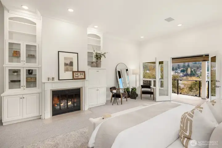 A true retreat, the primary suite offers a gas/wood-burning fireplace, private balcony, oversized walk-in closet, and a stunning spa-inspired bath.