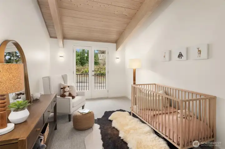 One of five secondary bedrooms on the upper level, not including the primary suite.