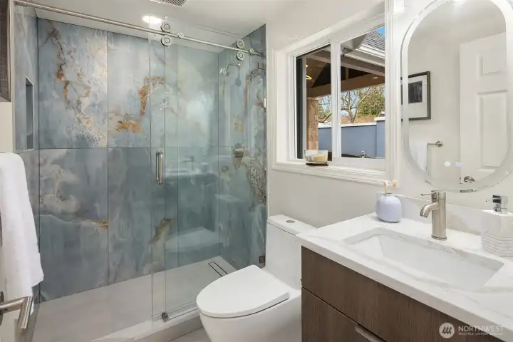 A 3/4 bath serves the main-floor guest suite or private office.