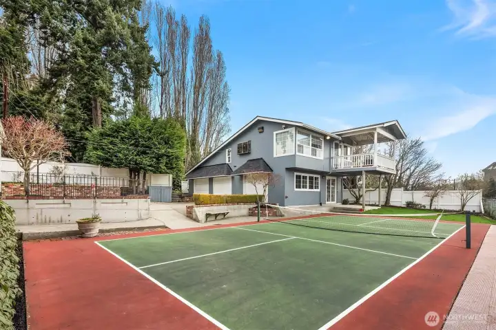 Enjoy a regulation pickleball court and a detached ADU with 1 bedroom and a 3/4 bath above a 3-car garage.