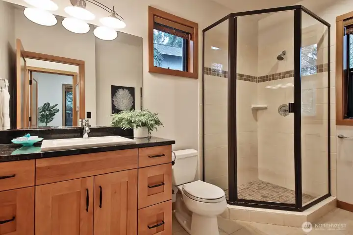 This is a wonderful 3/4 bath for guests.