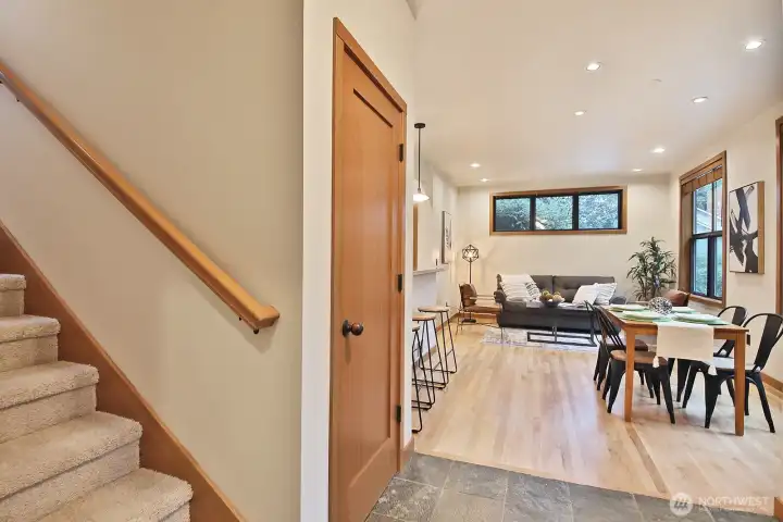 Stairway to the upper level primary suite.