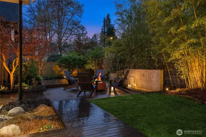 And the courtyard is the home’s outdoor centerpiece—private, serene, and beautifully designed for entertaining. Multiple gathering areas invite everything from quiet morning coffee to dinner parties that spill outside, while a calming water feature adds sound, movement, and an unmistakable sense of retreat—a true outdoor respite that feels like a hidden garden within the city.