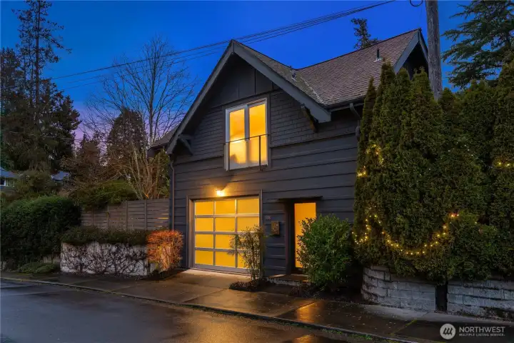 An oversized EV-ready garage adds modern convenience and flexibility, and there’s abundant parking—a true luxury in this close-in location.